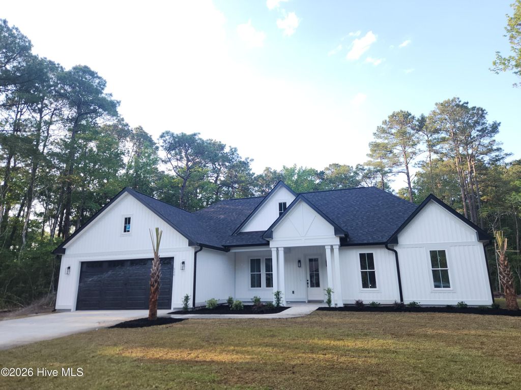 Photo of 520 Boundaryline Drive NW, Calabash, NC 28467 (MLS # 100574028)