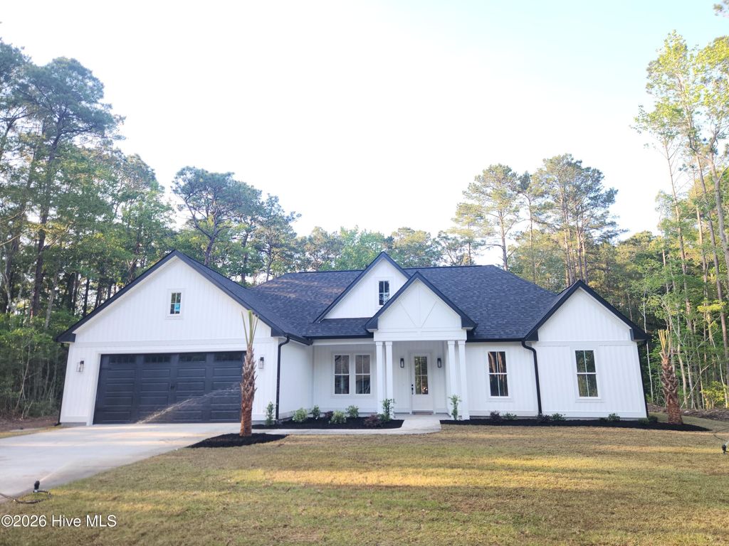 Photo of 520 Boundaryline Drive NW, Calabash, NC 28467 (MLS # 100574028)