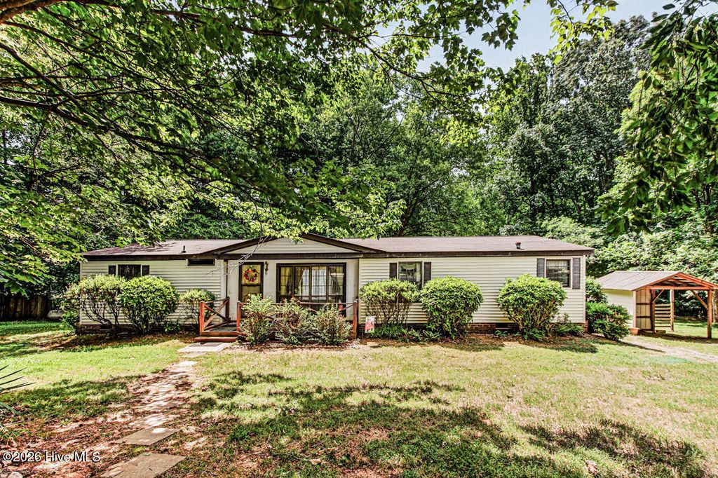 Photo of 2006 Soapstone Mountain Road, Staley, NC 27355 (MLS # 100582969)