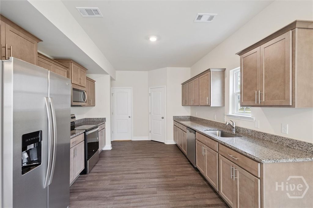 Photo of 717 Mill Creek Circle Cir, Hinesville, GA 31313 (MLS # SA344563)