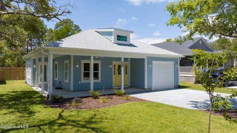 Photo of 165 NW 4th Street, Oak Island, NC 28465 (MLS # 100580266)