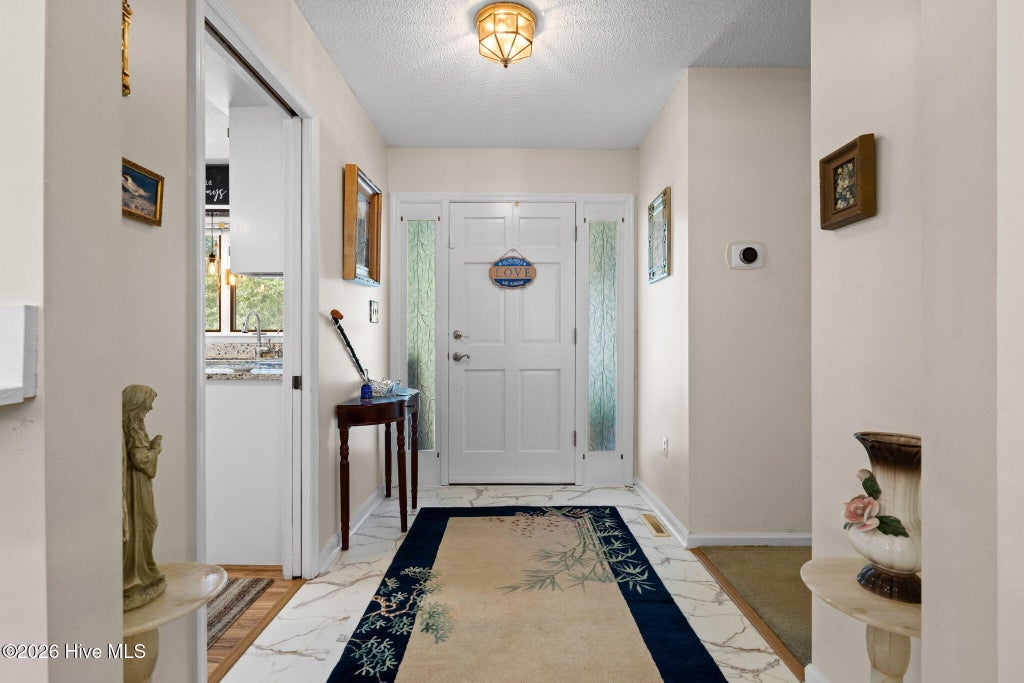 Photo of 20 Sandtrap Drive, Shallotte, NC 28470 (MLS # 100600050)