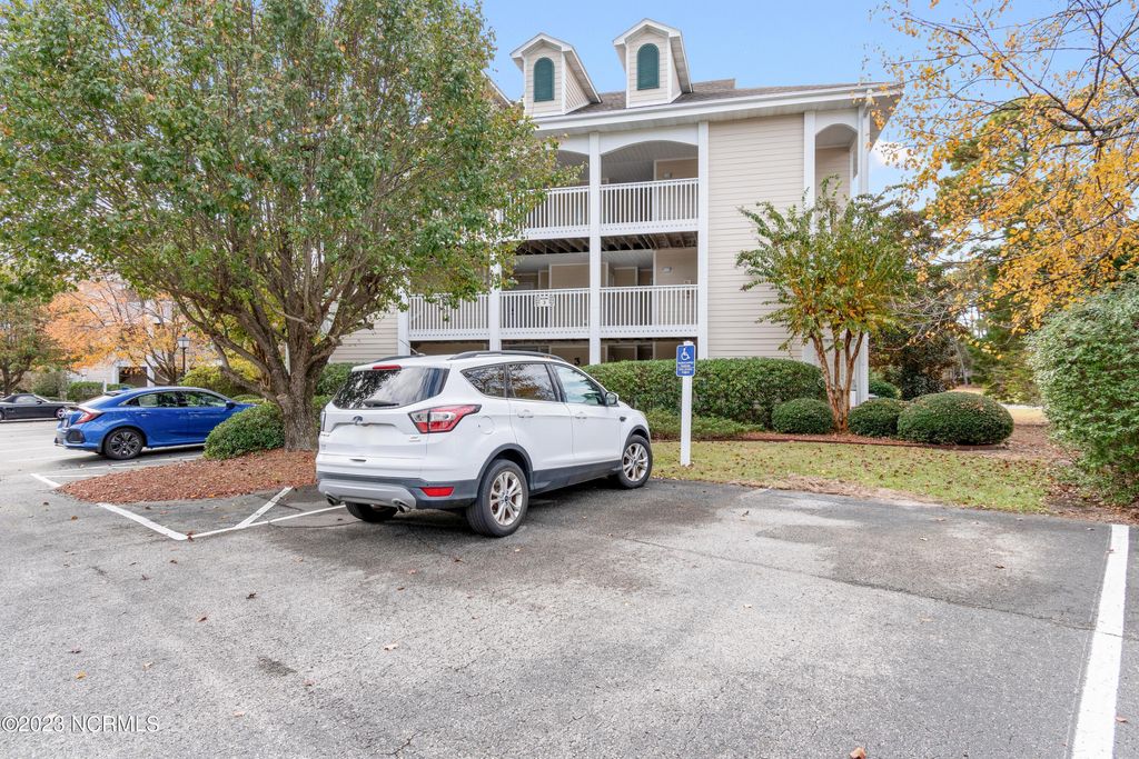 Photo of 3350 Club Villas Drive # 305, Southport, NC 28461 (MLS # 100564756)