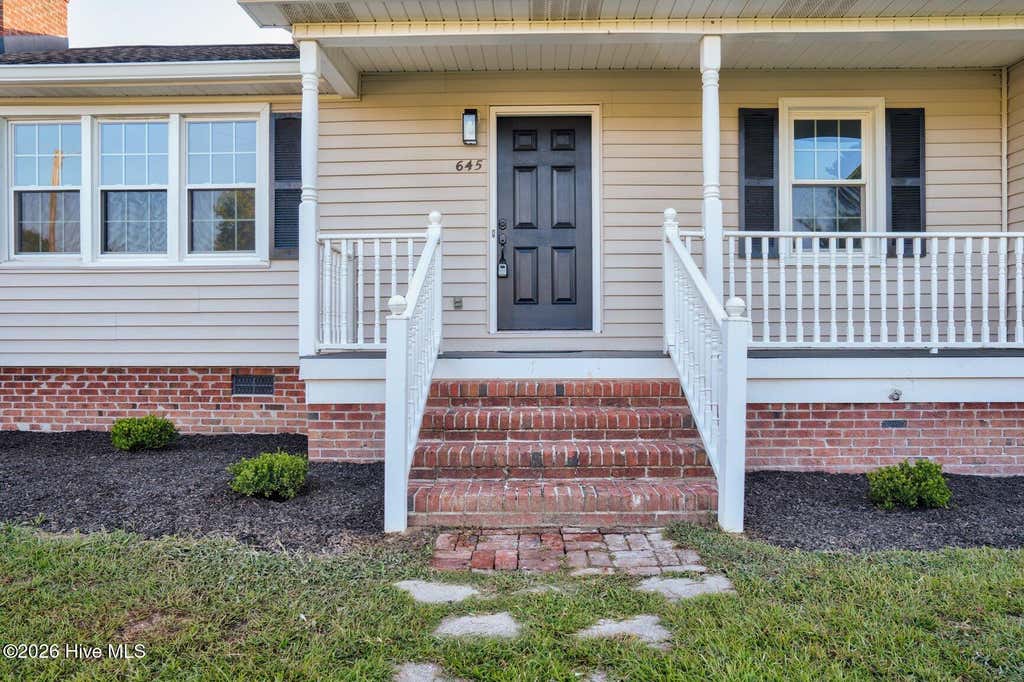 Photo of 645 Sand Trap Drive, Rocky Mount, NC 27804 (MLS # 100599004)