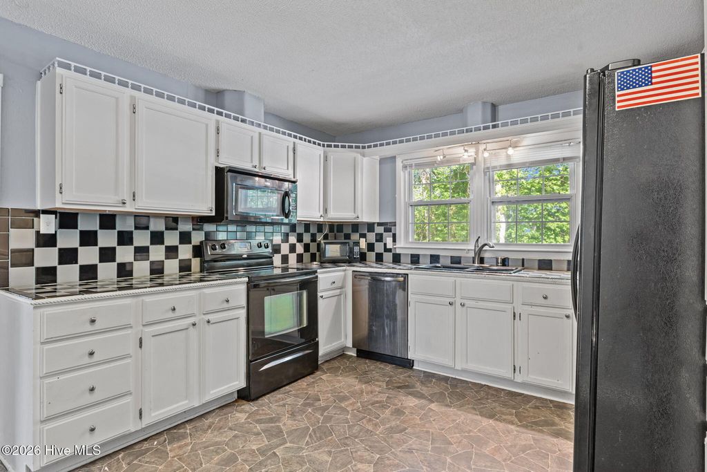 Photo of 5308 Foxfire Road, Fayetteville, NC 28303 (MLS # 100567433)