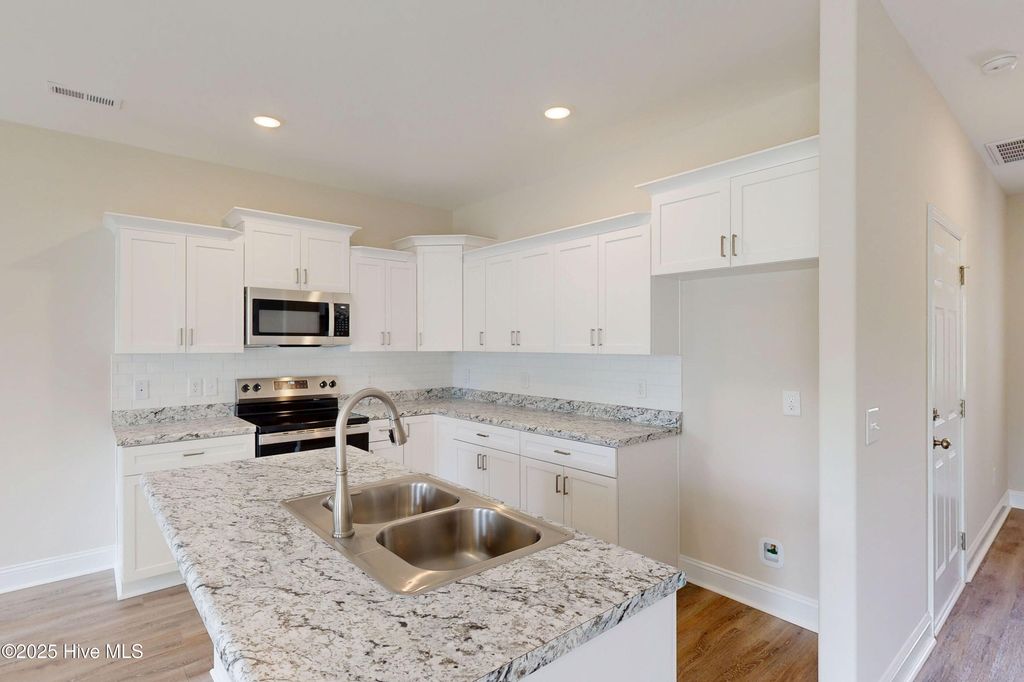 Photo of 211 Sandpiper Place, Holly Ridge, NC 28445 (MLS # 100493015)