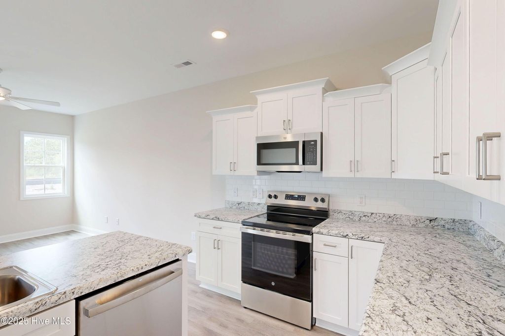 Photo of 211 Sandpiper Place, Holly Ridge, NC 28445 (MLS # 100493015)