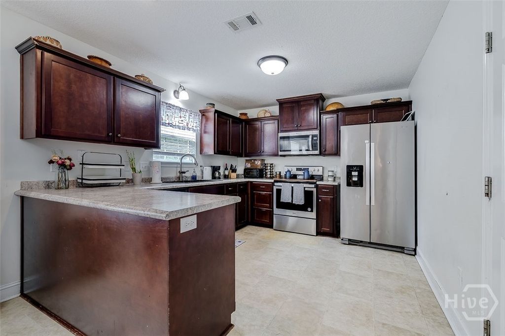 Photo of 677 Piedmont Avenue, Hinesville, GA 31313 (MLS # SA352393)