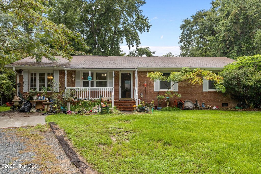 Photo of 720 Lea Drive, Hampstead, NC 28443 (MLS # 100566802)