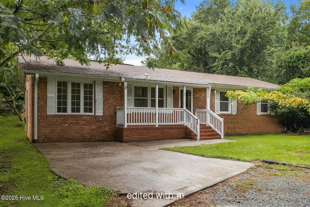 Photo of 720 Lea Drive, Hampstead, NC 28443 (MLS # 100566802)