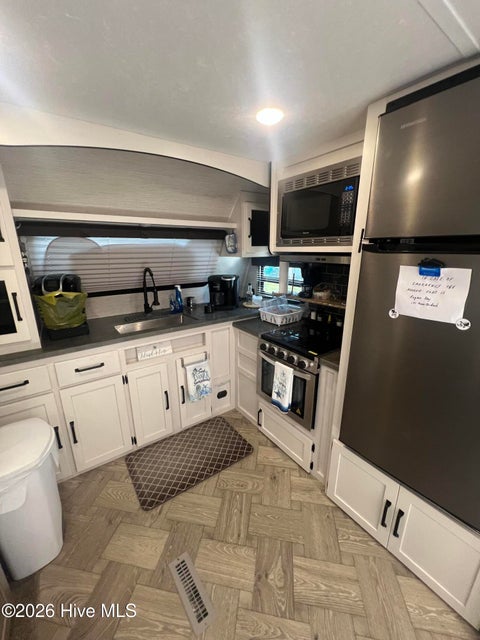 Tiny photo for 131 Quartedeck Street, North Topsail Beach, NC 28460 (MLS # 100578793)