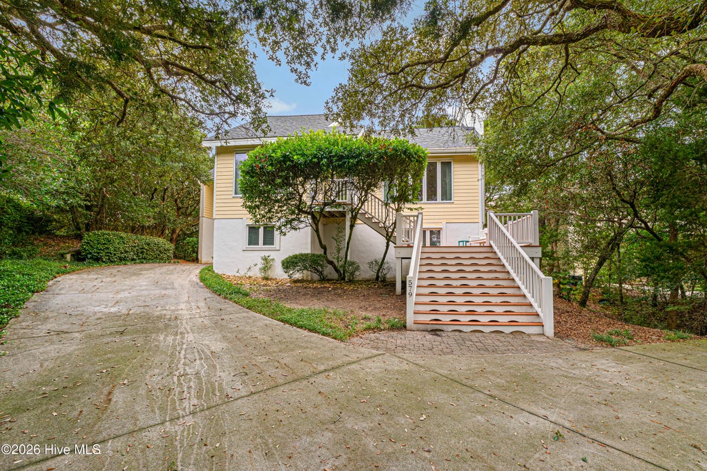 Photo of 579 Coral Ridge Road, Pine Knoll Shores, NC 28512 (MLS # 100608669)