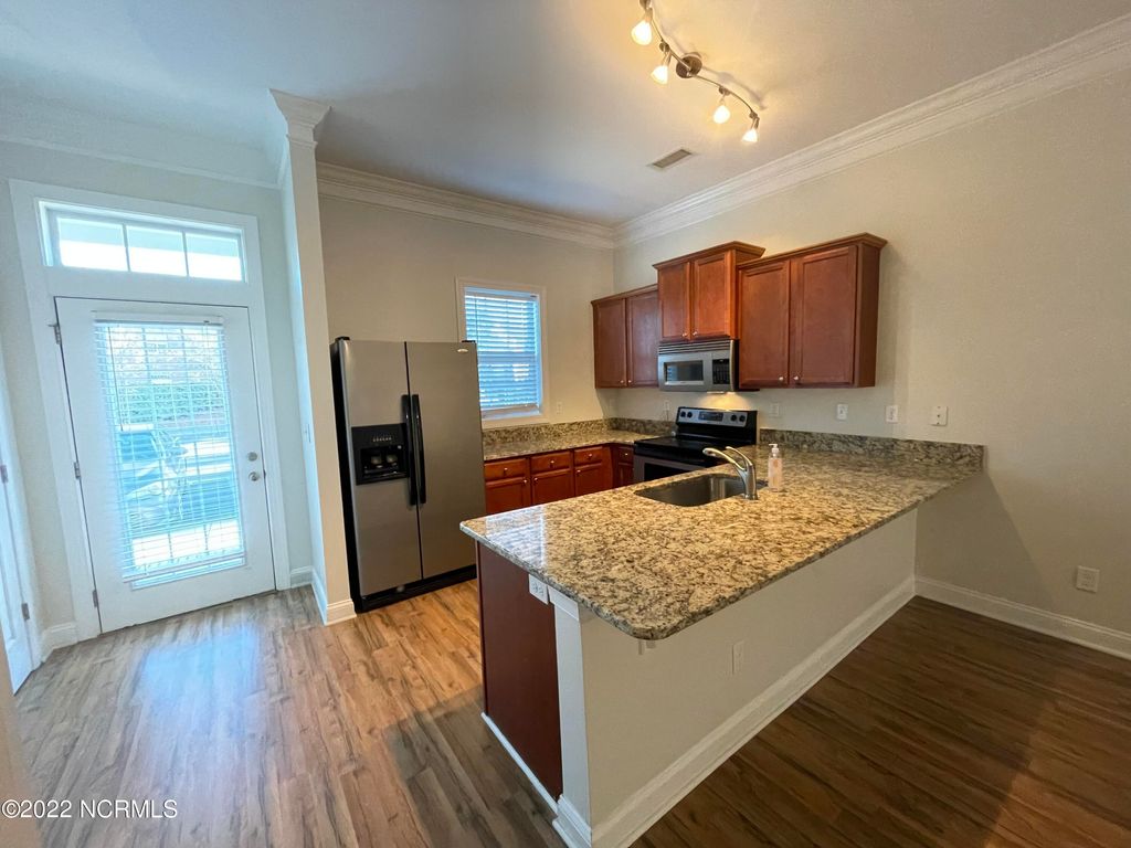 Photo of 4804 Exton Park Loop, Castle Hayne, NC 28429 (MLS # 100565760)