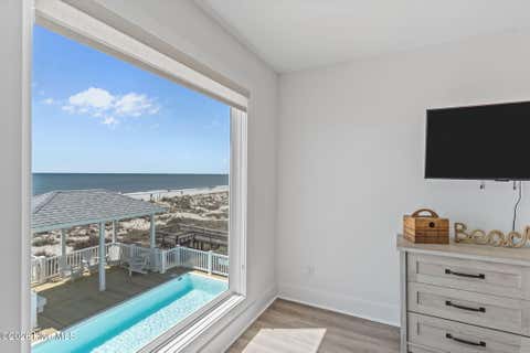 Tiny photo for 2205 E Beach Drive, Oak Island, NC 28465 (MLS # 100598231)