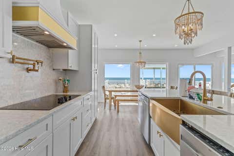 Tiny photo for 2205 E Beach Drive, Oak Island, NC 28465 (MLS # 100598231)