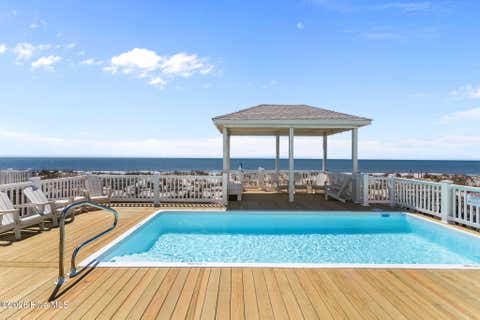 Tiny photo for 2205 E Beach Drive, Oak Island, NC 28465 (MLS # 100598231)