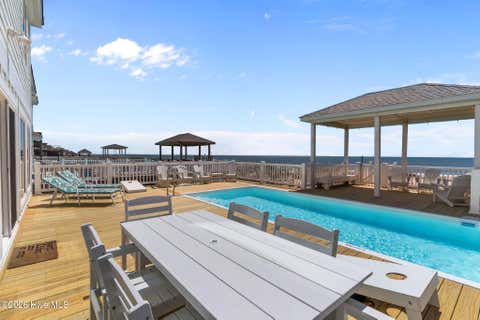 Tiny photo for 2205 E Beach Drive, Oak Island, NC 28465 (MLS # 100598231)