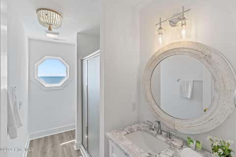Tiny photo for 2205 E Beach Drive, Oak Island, NC 28465 (MLS # 100598231)