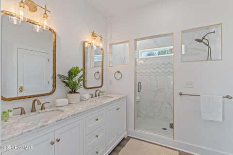 Tiny photo for 2205 E Beach Drive, Oak Island, NC 28465 (MLS # 100598231)
