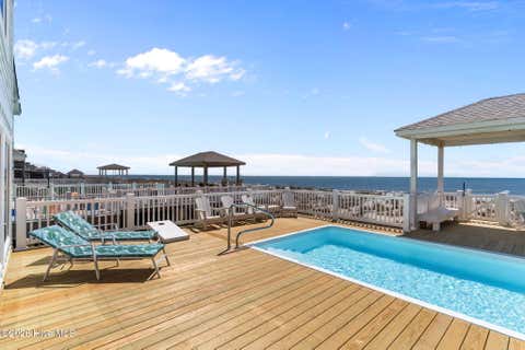 Tiny photo for 2205 E Beach Drive, Oak Island, NC 28465 (MLS # 100598231)