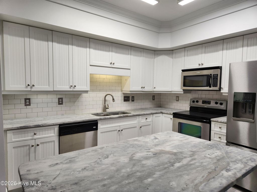 Photo of 300 Lighthouse Lane #A-1, Cedar Point, NC 28584 (MLS # 100555849)