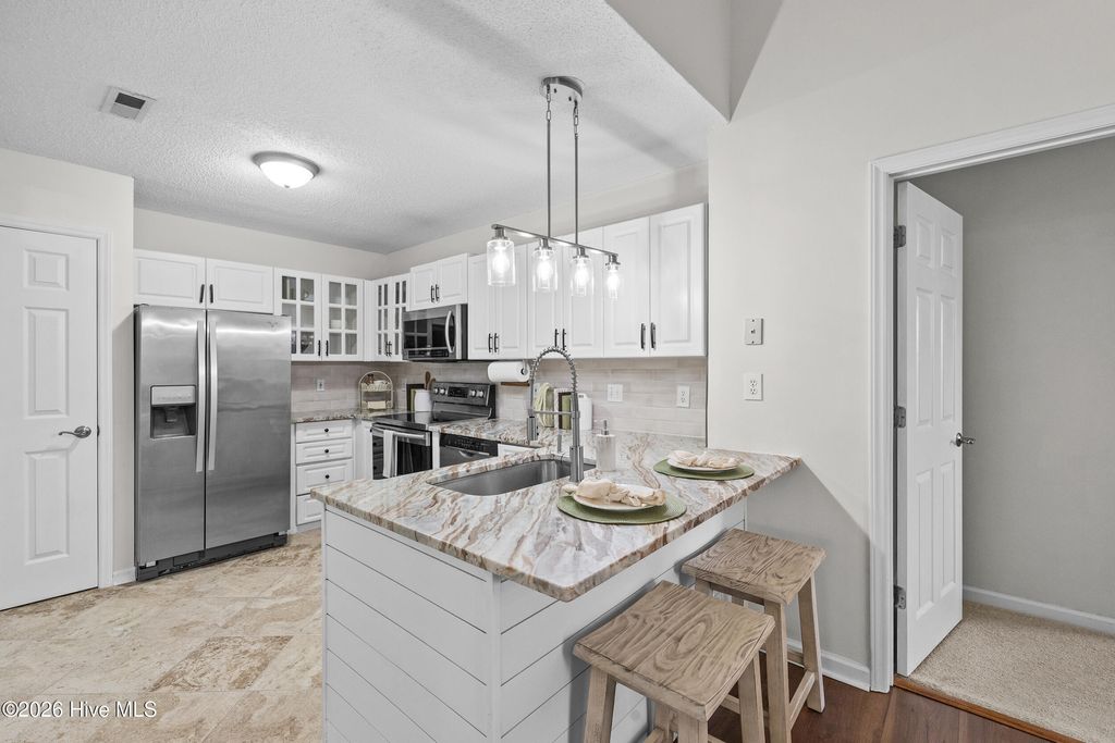 Photo of 4109 Breezewood Drive #204, Wilmington, NC 28412 (MLS # 100582604)