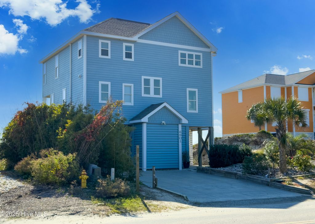 Photo of 6901 W Beach Drive, Oak Island, NC 28465 (MLS # 100541150)