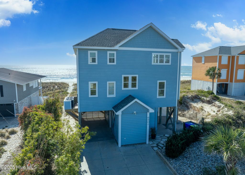 Photo of 6901 W Beach Drive, Oak Island, NC 28465 (MLS # 100541150)