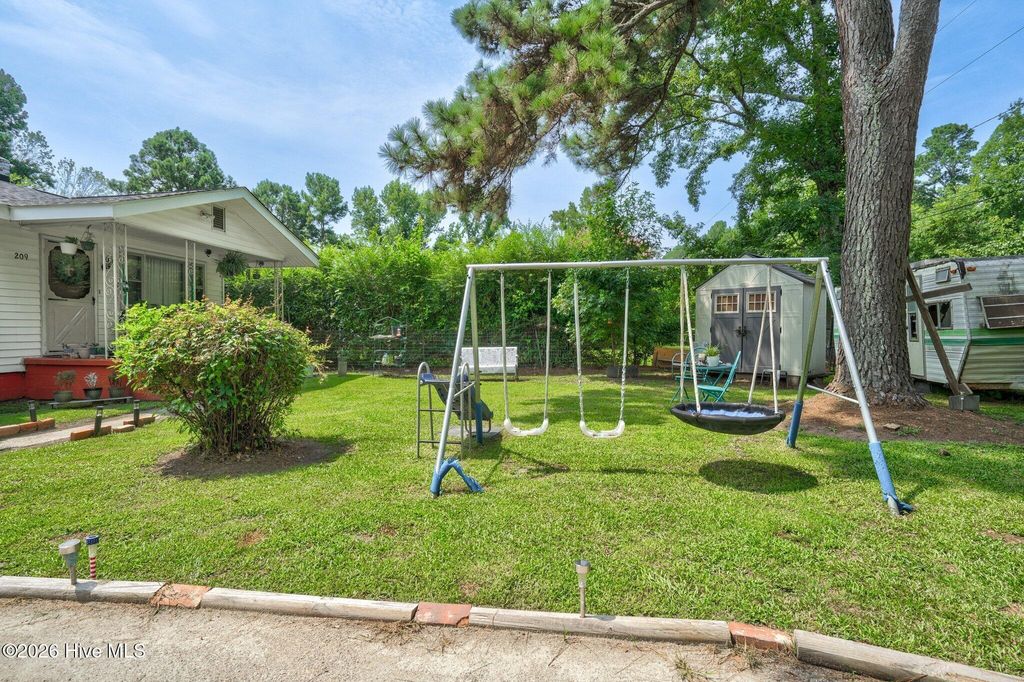 Photo of 209 SE Railroad Street, Whitakers, NC 27891 (MLS # 100549577)