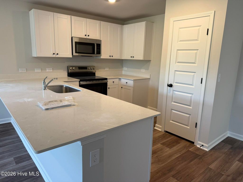 Photo of 1119 Cooper Hawk Lane SW, Ocean Isle Beach, NC 28469 (MLS # 100569022)