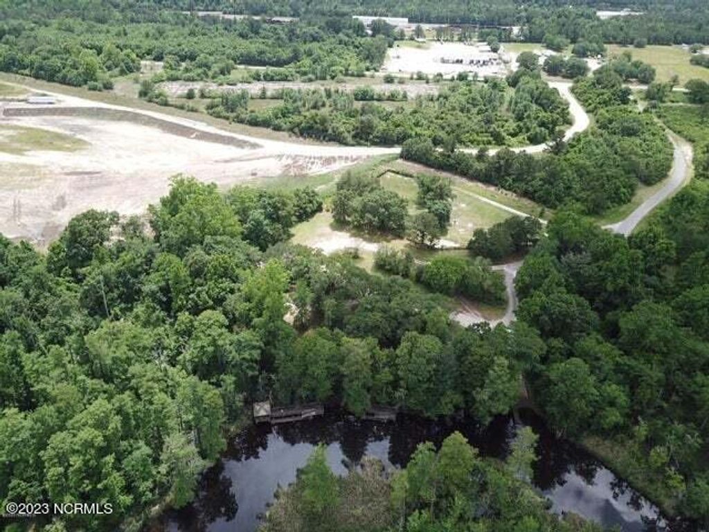 Photo of 0 Cedar Hill Road NE, Navassa, NC 28451 (MLS # 100394146)