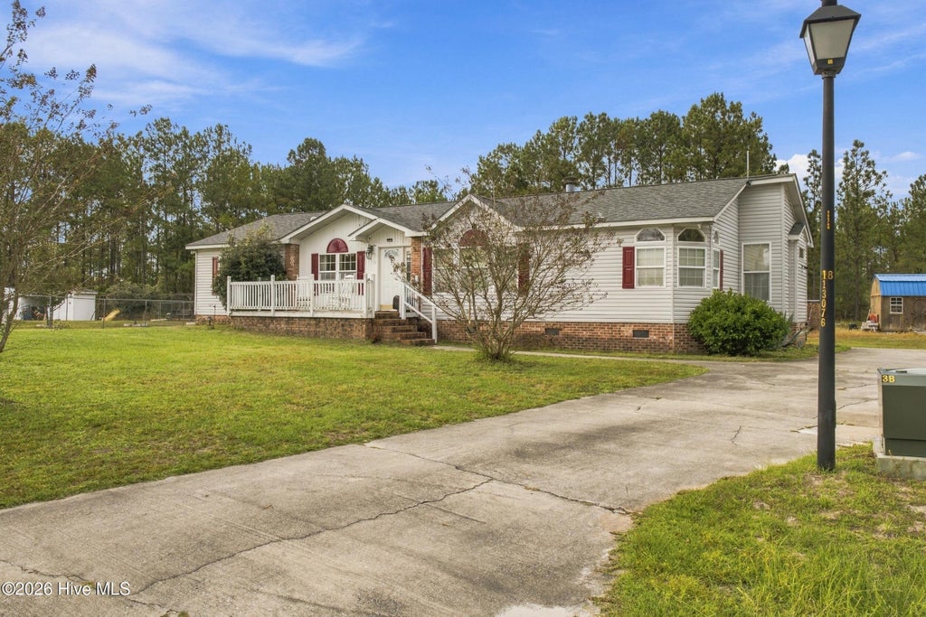 Photo of 7133 Roebuck Lane NE, Leland, NC 28451 (MLS # 100611758)