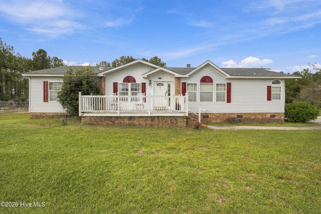 Photo of 7133 Roebuck Lane NE, Leland, NC 28451 (MLS # 100611758)