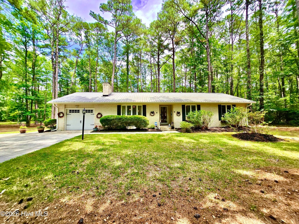 Photo of 51 Sunfield Drive, Carolina Shores, NC 28467 (MLS # 100577422)
