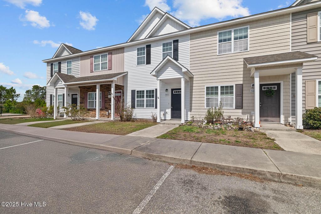 Photo of 505 Oyster Rock Lane, Sneads Ferry, NC 28460 (MLS # 100516603)