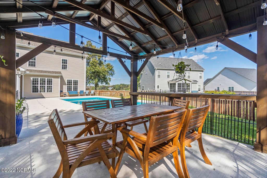 Photo of 114 Camelot Drive, Holly Ridge, NC 28445 (MLS # 100556304)