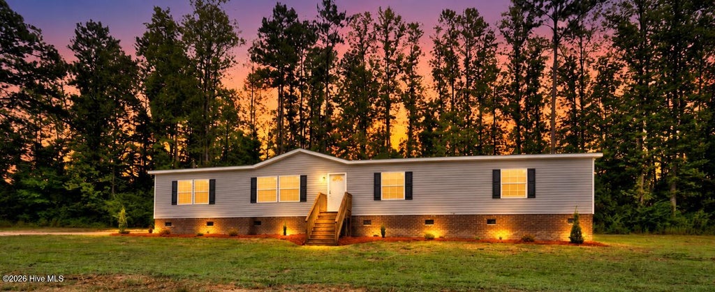 Photo of 8711 Pleasant Grove Church Road, Spring Hope, NC 27882 (MLS # 100605906)