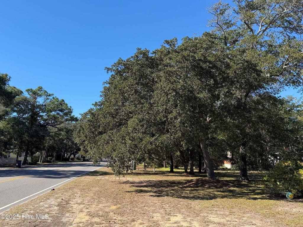 Photo of 7506 E Oak Island Drive, Oak Island, NC 28465 (MLS # 100539557)