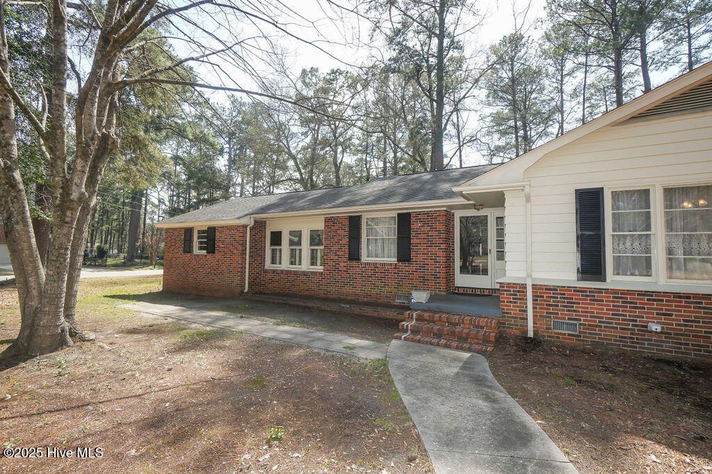 Photo of 1201 Charles Drive, Laurinburg, NC 28352 (MLS # 100539404)