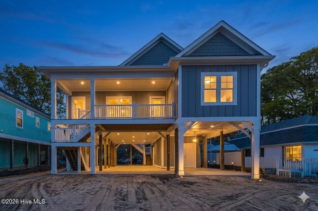 Photo of 125 NW 19th Street, Oak Island, NC 28465 (MLS # 100564394)