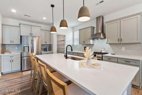 Tiny photo for 302 Sailor Sky Way, Hampstead, NC 28443 (MLS # 100592184)