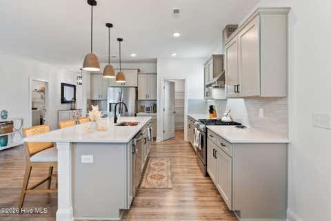 Tiny photo for 302 Sailor Sky Way, Hampstead, NC 28443 (MLS # 100592184)