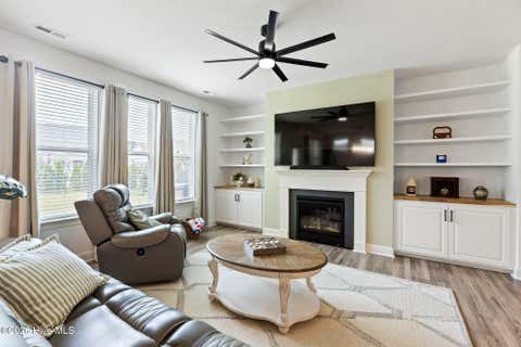 Tiny photo for 302 Sailor Sky Way, Hampstead, NC 28443 (MLS # 100592184)