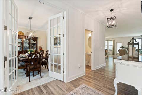 Tiny photo for 302 Sailor Sky Way, Hampstead, NC 28443 (MLS # 100592184)