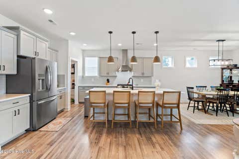 Tiny photo for 302 Sailor Sky Way, Hampstead, NC 28443 (MLS # 100592184)