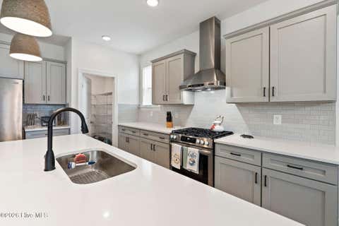 Tiny photo for 302 Sailor Sky Way, Hampstead, NC 28443 (MLS # 100592184)