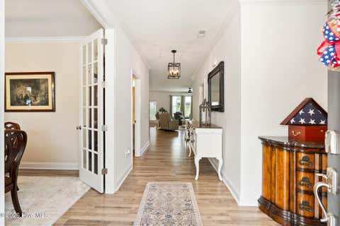 Tiny photo for 302 Sailor Sky Way, Hampstead, NC 28443 (MLS # 100592184)