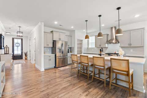 Tiny photo for 302 Sailor Sky Way, Hampstead, NC 28443 (MLS # 100592184)