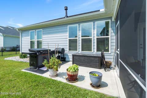 Tiny photo for 302 Sailor Sky Way, Hampstead, NC 28443 (MLS # 100592184)