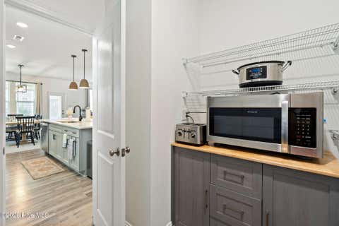 Tiny photo for 302 Sailor Sky Way, Hampstead, NC 28443 (MLS # 100592184)